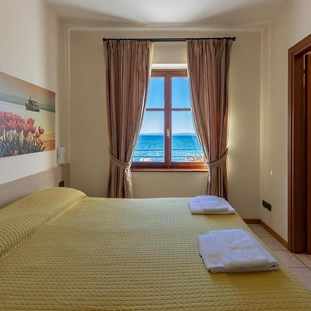 Locanda Le Palafitte Bardolino Bagian luar foto