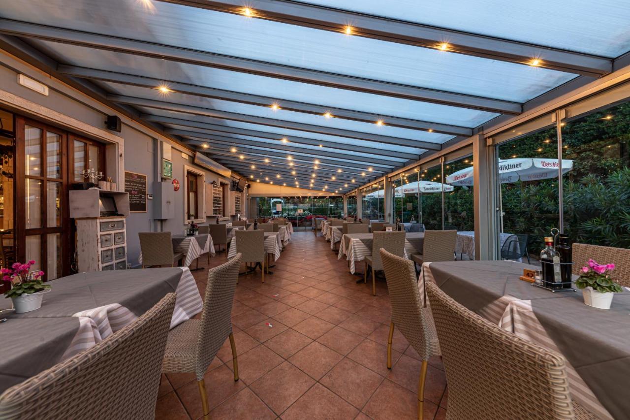 Locanda Le Palafitte Bardolino Bagian luar foto